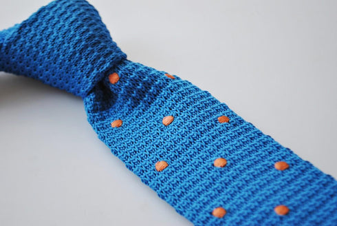 royal blue skinny knitted tie with orange polka dots